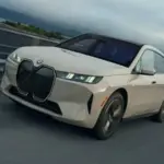 BMW iX electric SUV front profile showcasing futuristic design and illuminated kidney grille