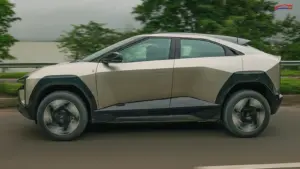 Mahindra BE 6 side profile coupe SUV design alloy wheels and aerodynamic shape