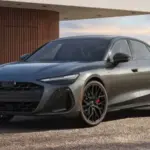 Audi A6 2026 luxury sedan front profile with sleek design and LED headlights