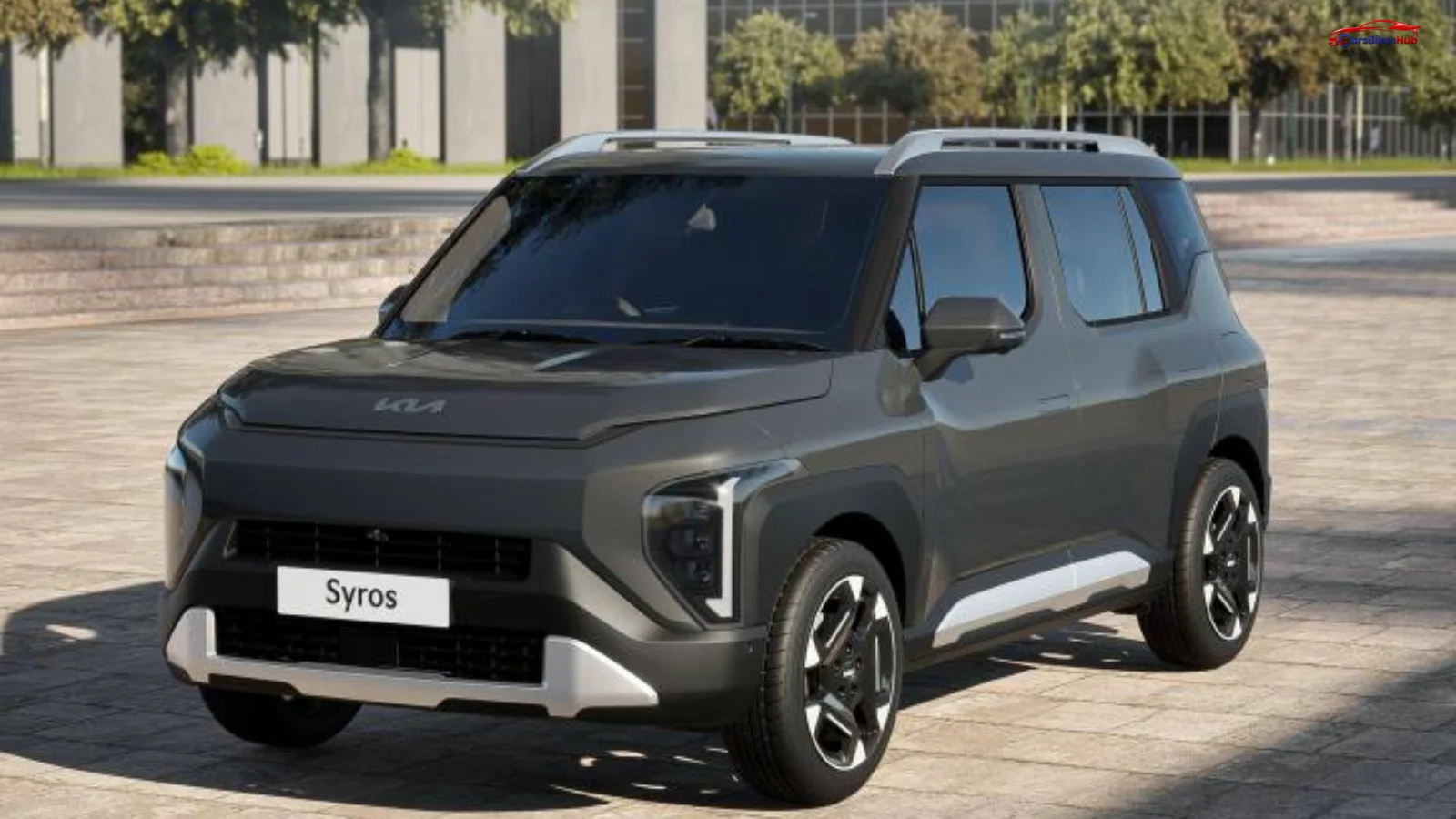 Kia Syros HTK EX front profile parked on road showcasing LED DRLs and alloy wheels
