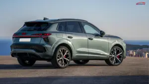 Front three-quarter view of the Audi Q3 luxury SUV parked on a city road showcasing its premium design and signature LED headlights