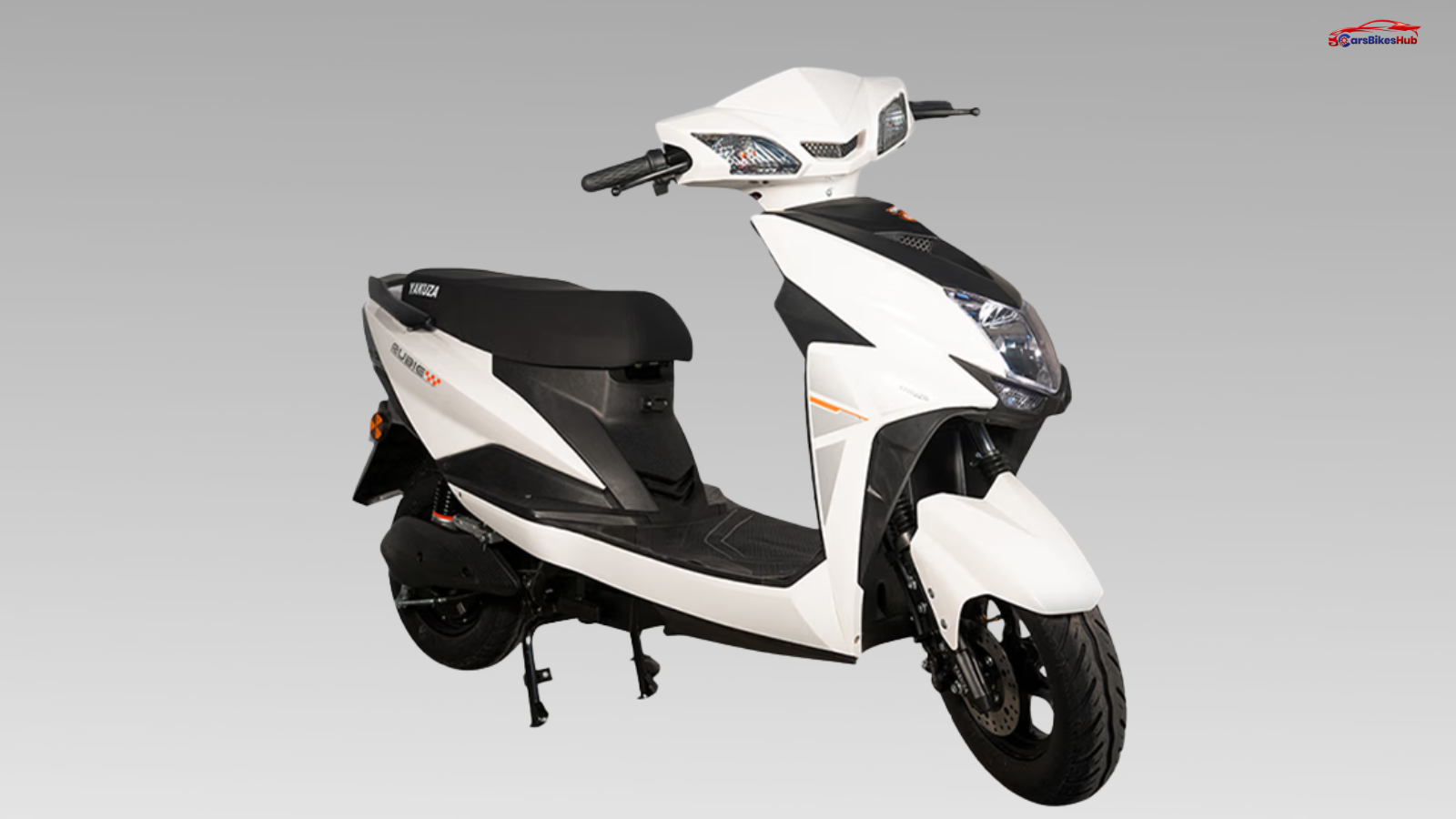 Yakuza Rubie electric scooter parked in an urban setting showcasing modern design, LED headlamp, and compact affordable EV styling.