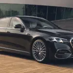 Front three-quarter view of the 2026 Mercedes-Benz S-Class Facelift luxury sedan showcasing its updated grille, redesigned LED headlights, premium alloy wheels, and elegant flagship sedan styling.