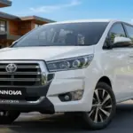2026 Toyota Innova Crysta premium MPV parked showcasing front design and updated styling
