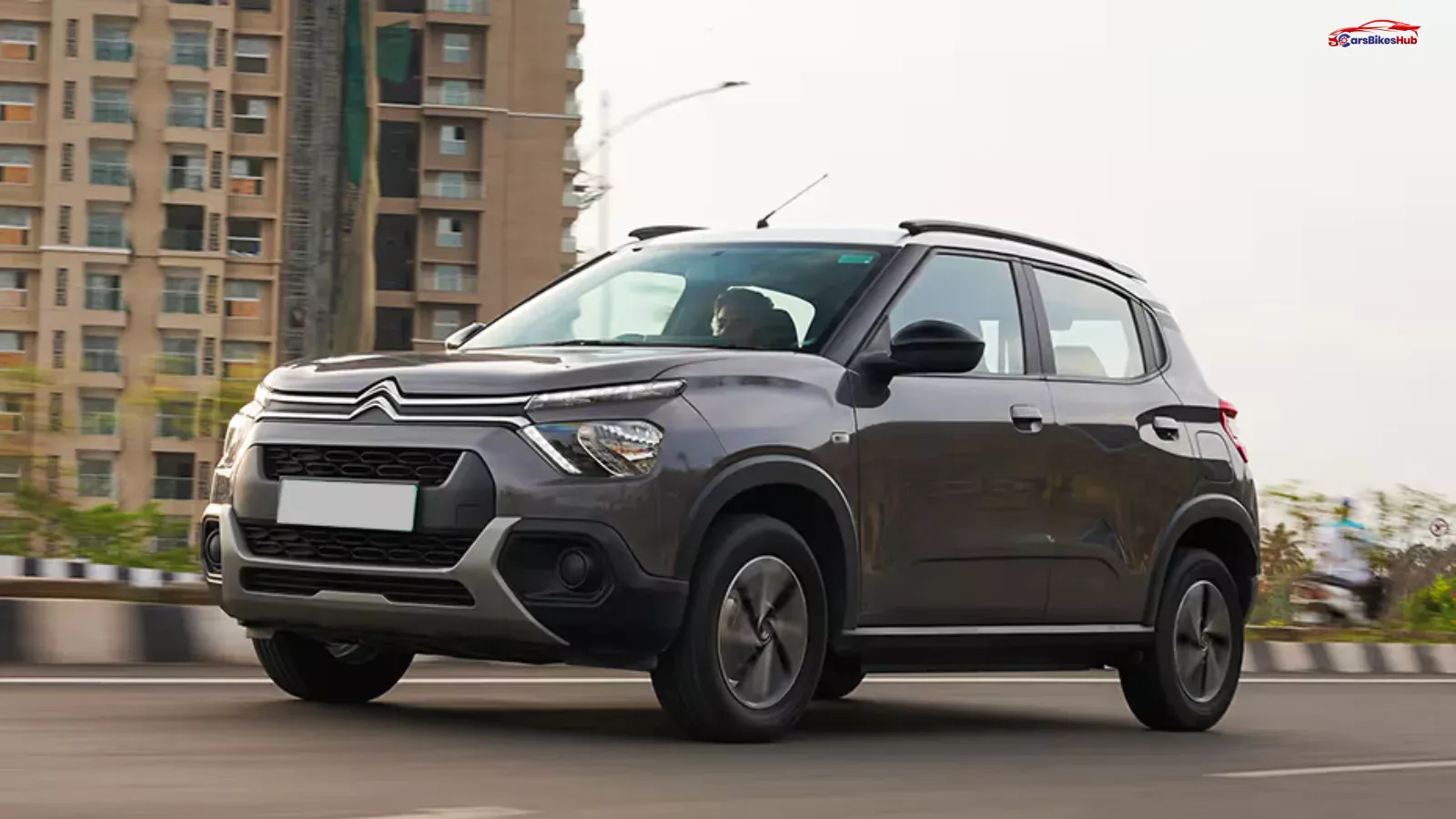 Citroen eC3 electric SUV hatchback parked on a city road showcasing its modern design and EV styling