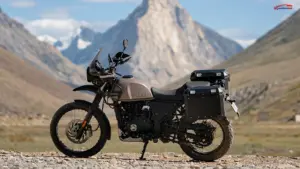 Royal Enfield Himalayan 440 parked on a rocky mountain road with an alpine landscape in the background.