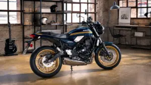 2027 Kawasaki Z650RS motorcycle in blue with gold wheels