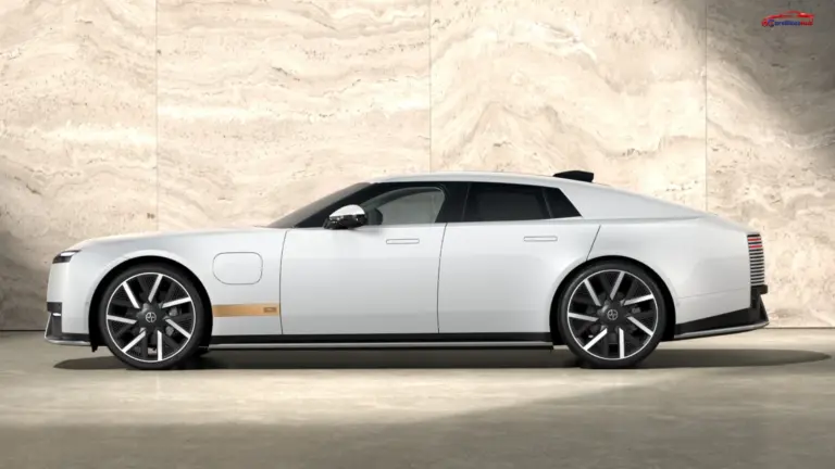 Jaguar Type 01 electric GT in white, featuring a sleek side profile and large alloy wheels.