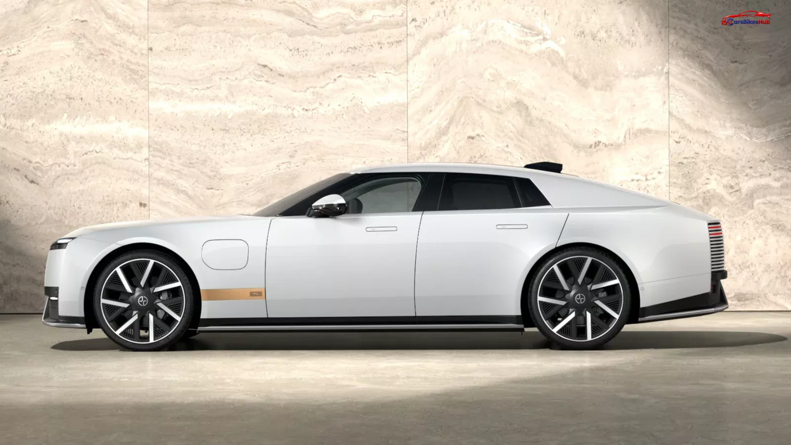 Jaguar Type 01 electric GT in white, featuring a sleek side profile and large alloy wheels.