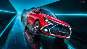 Red 2026 Toyota Glanza facelift showcasing its updated front grille and bumper in a futuristic setting.