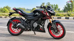 Bajaj Pulsar N250 SS in black with red graphics and red alloy wheels, featuring gold-finished USD front forks.