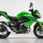 Kawasaki Z300 in green with black alloy wheels, angular bodywork and an exposed parallel-twin engine.